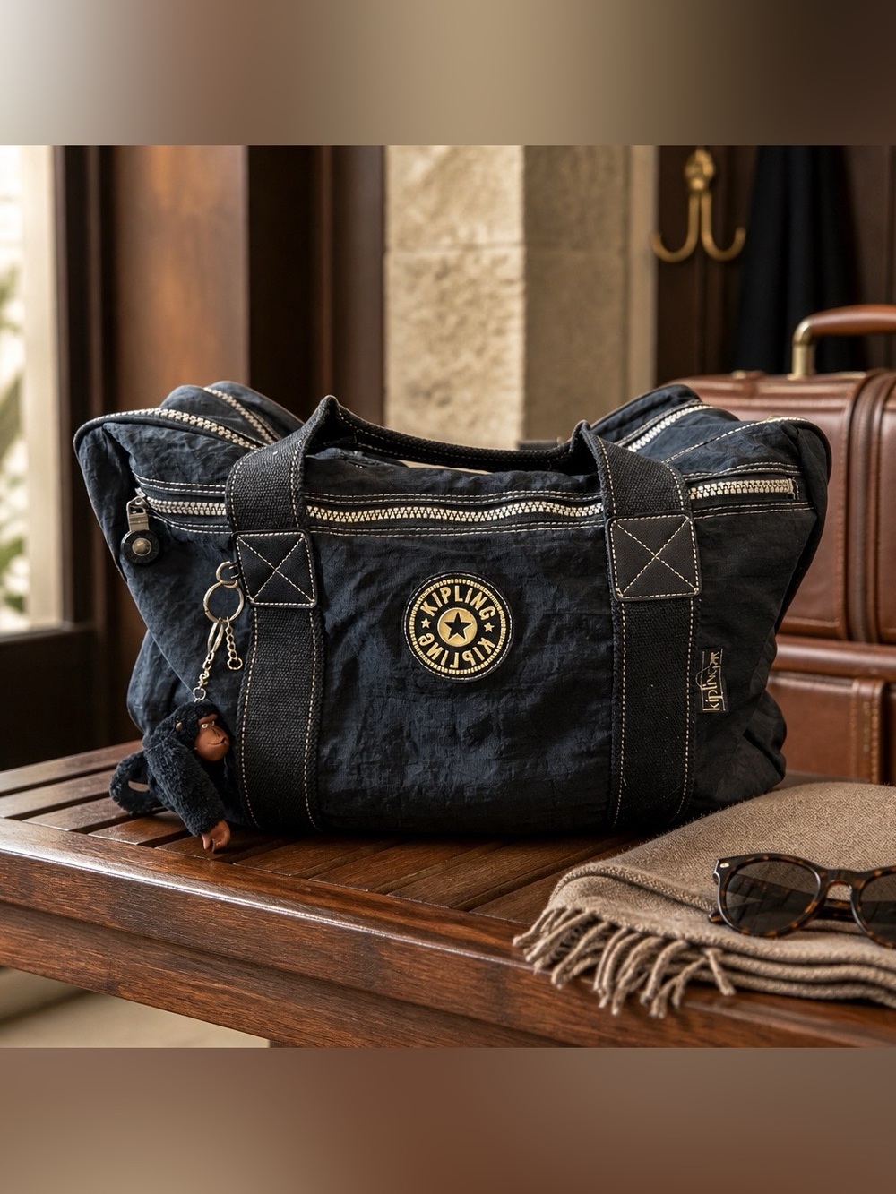 Kipling Navy Canvas Duffel Bag with Monkey Charm
